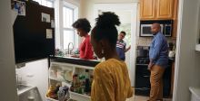 Black family in their kitchen