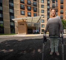 Resident in front of The Overlook at Oxon Run in Washington, D.C.