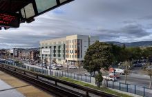 Photo of Train Station and Apartment Building