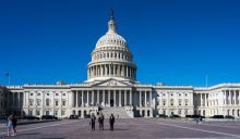 Women walking in front of U.S. Capitol