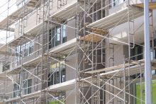 Building under construction with scaffolding