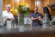 Homecoming Project family in the kitchen