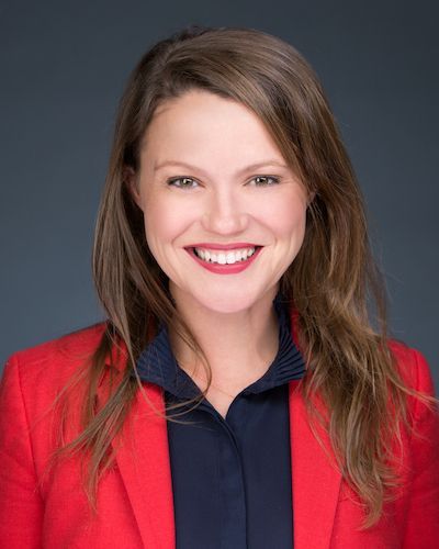 Woman in Red Jacket and Black Blouse