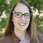 Headshot of Nancy Burke, CEO, The Saint Francis Center