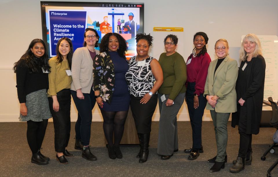 The Enterprise team and keynote speakers, all women, posing for a photo.